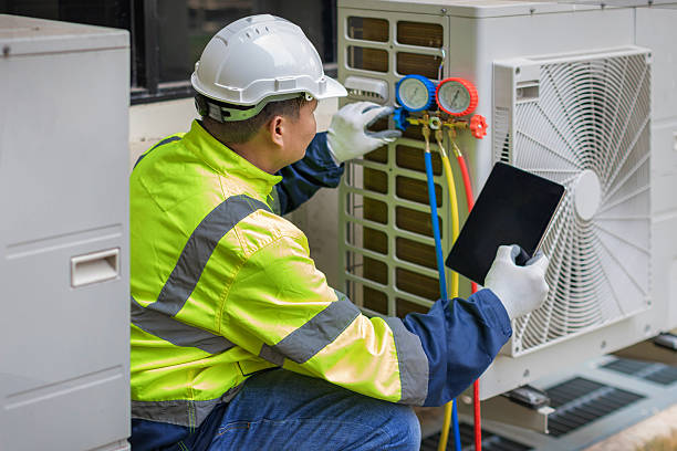 Professional Air Conditioning Repair technician working in Blue Rock, OH